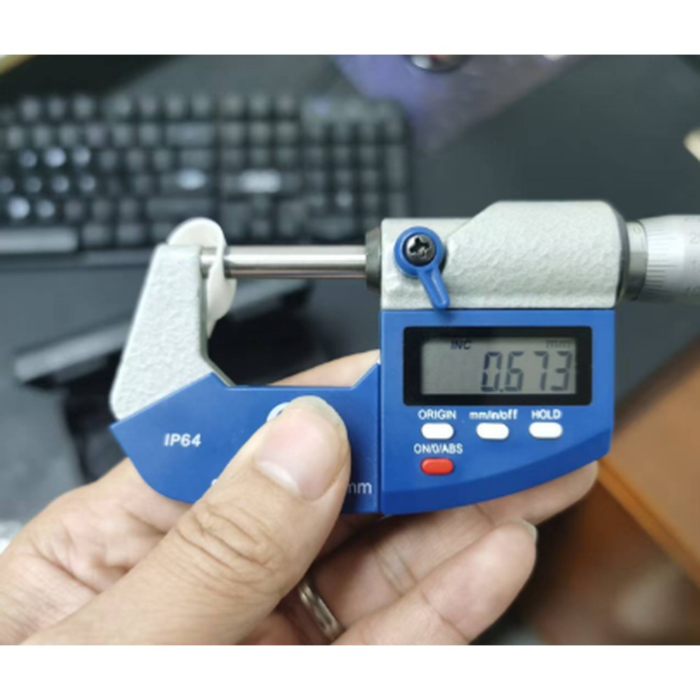Component thickness measured with a digital micrometer